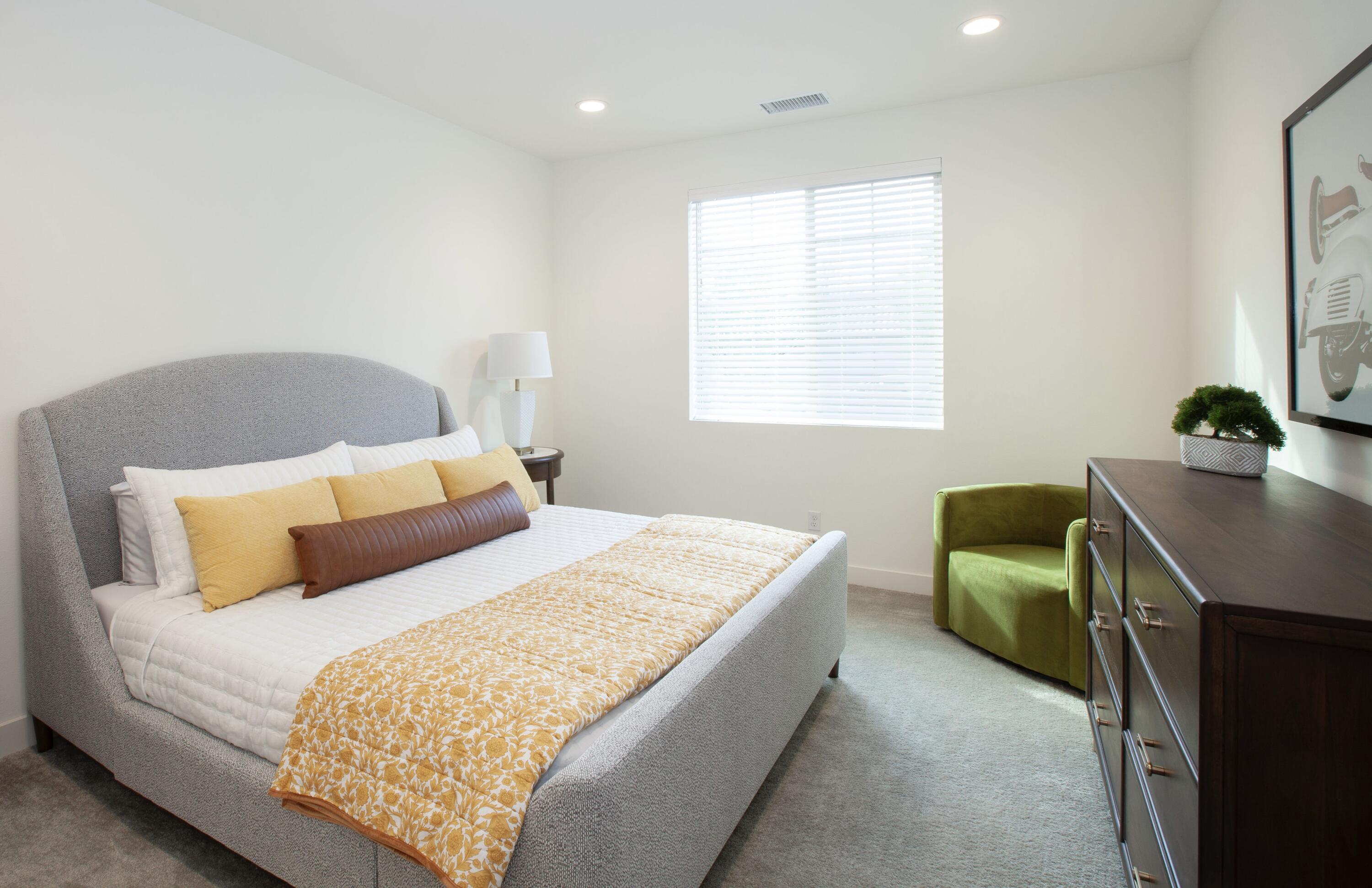 80215 Whisper Rock Way La Quinta, CA 92253 - Photo 12 of 63 a bedroom with a bed and a window