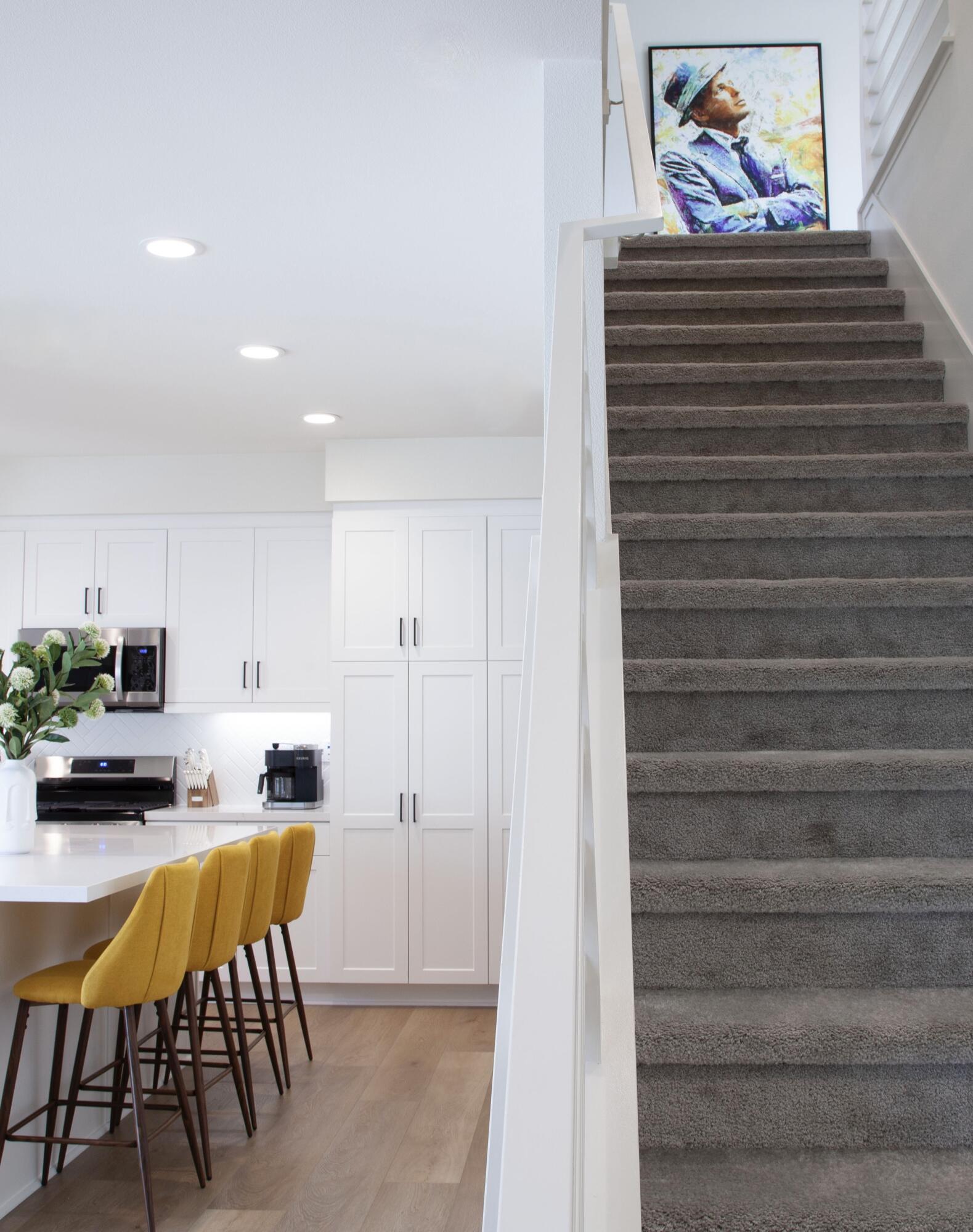 80215 Whisper Rock Way La Quinta, CA 92253 - Photo 19 of 63 a view of kitchen with furniture and wooden floor