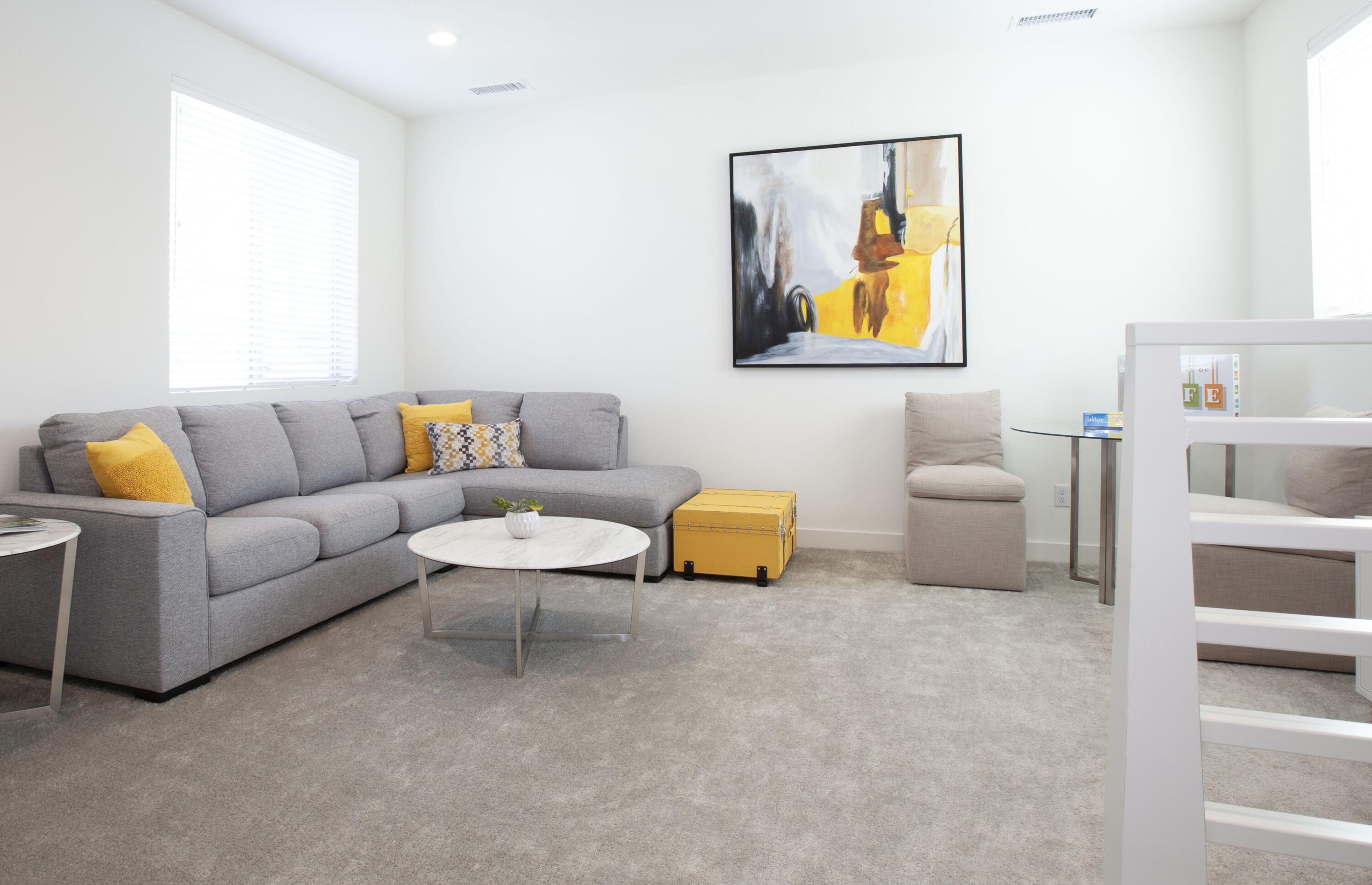 80215 Whisper Rock Way La Quinta, CA 92253 - Photo 20 of 63 a living room with furniture and a couch