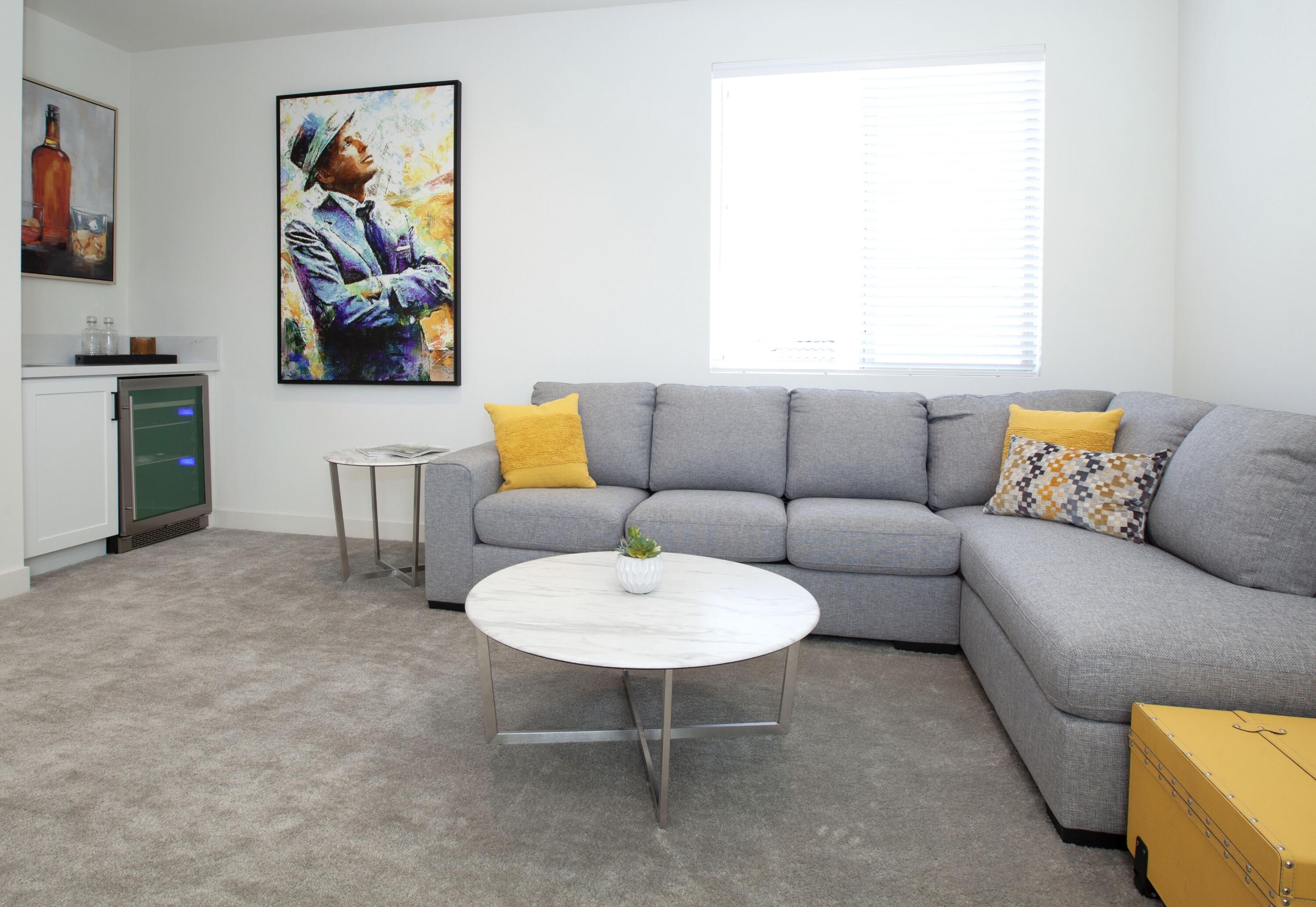 80215 Whisper Rock Way La Quinta, CA 92253 - Photo 21 of 63 a living room with furniture and a rug