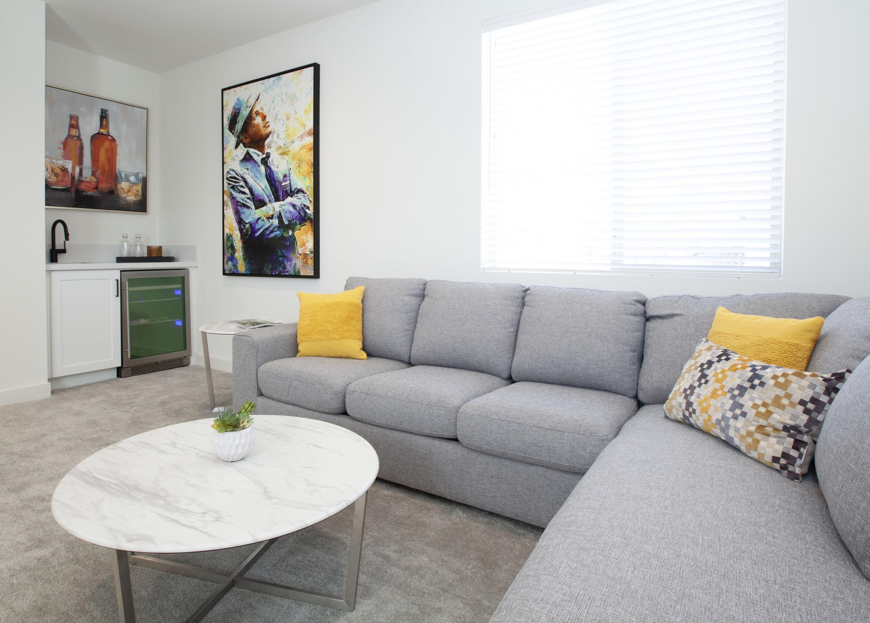 80215 Whisper Rock Way La Quinta, CA 92253 - Photo 22 of 63 a living room with furniture and kitchen view