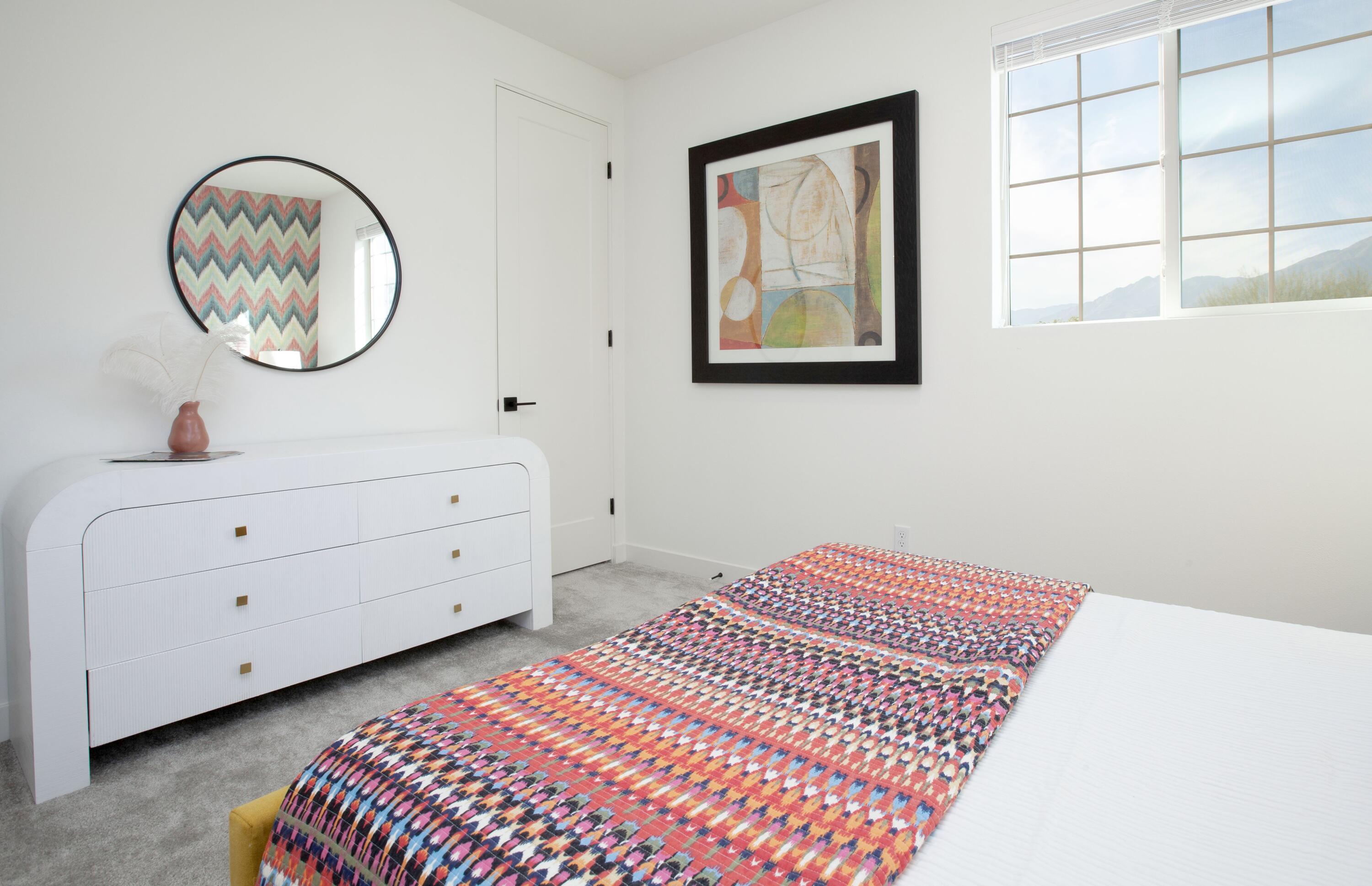 80215 Whisper Rock Way La Quinta, CA 92253 - Photo 30 of 63 a bedroom with a bed and a closet