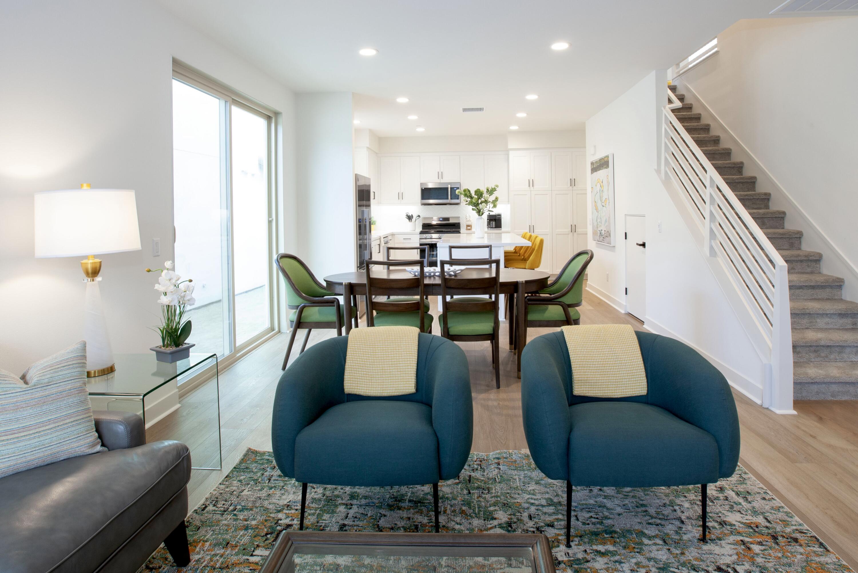 80215 Whisper Rock Way La Quinta, CA 92253 - Photo 3 of 63 a living room with furniture and a wooden floor