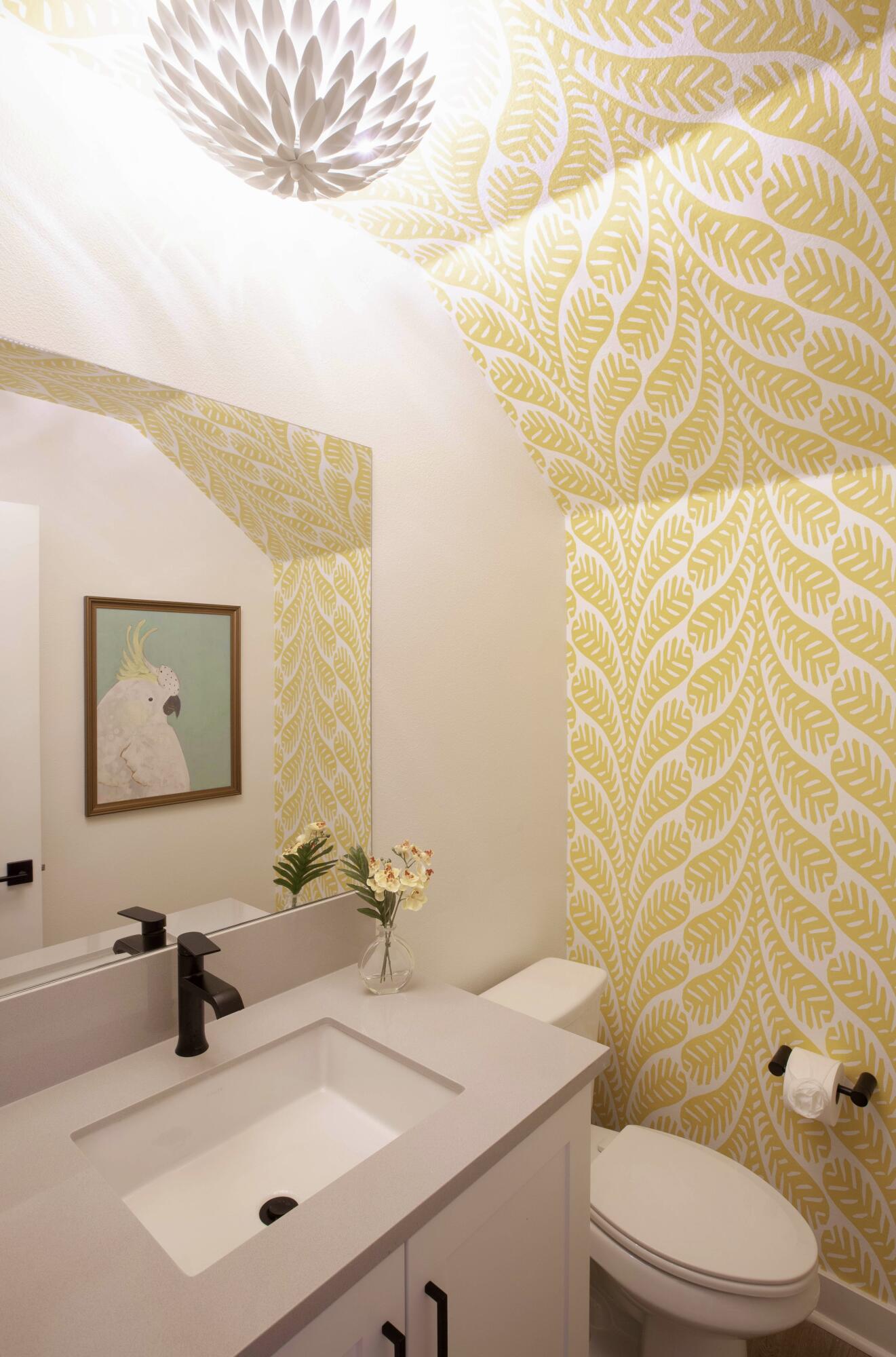 80215 Whisper Rock Way La Quinta, CA 92253 - Photo 36 of 63 a bathroom with a sink a toilet and shower curtain