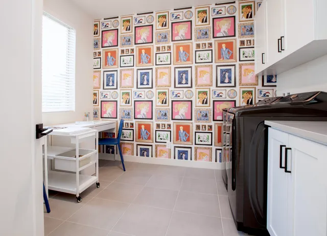 a view of balcony with two chairs and a potted plant