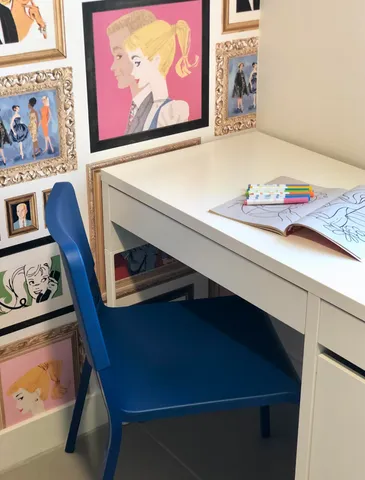 a view of a patio with couches table and chairs under an umbrella
