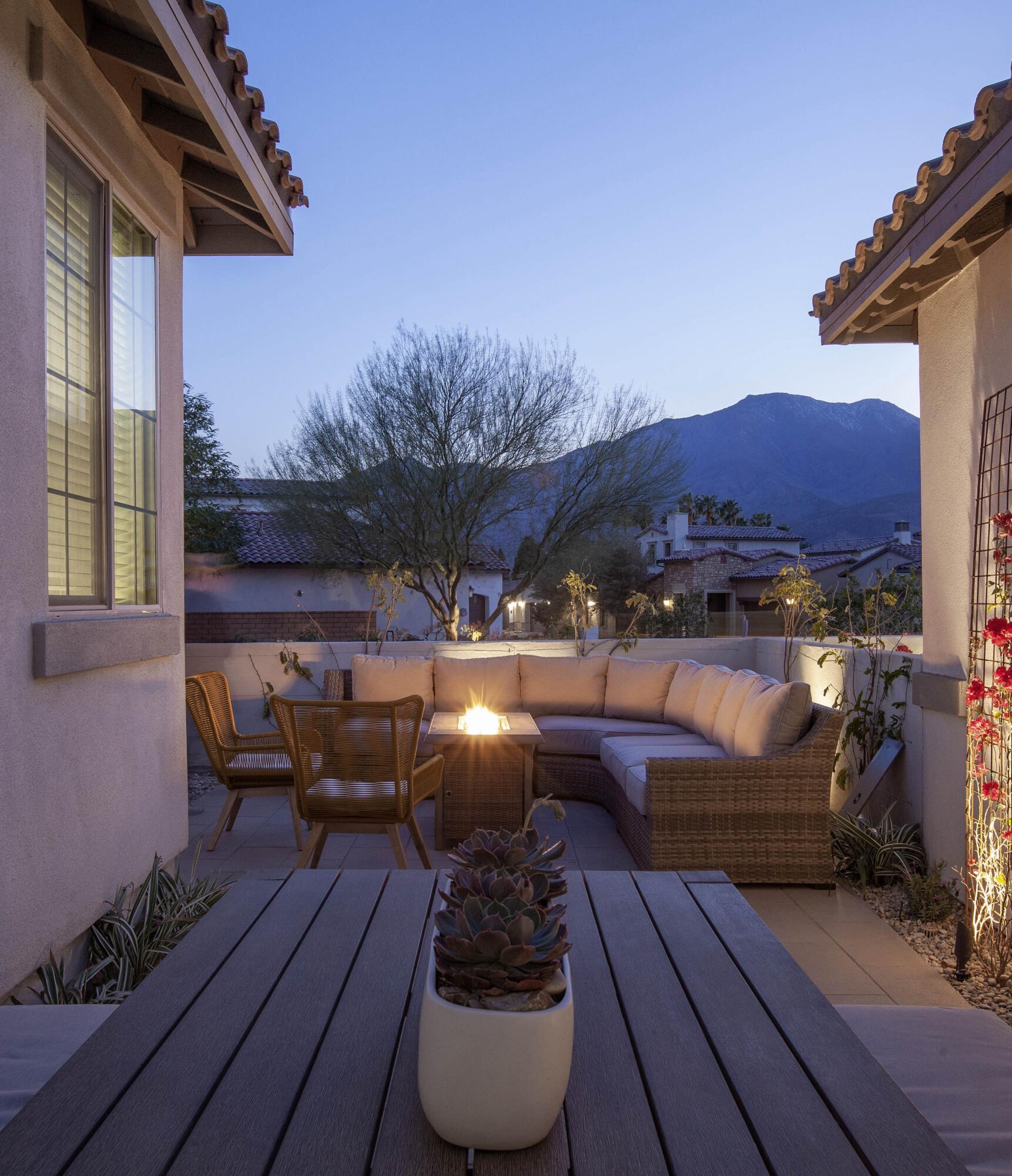 80215 Whisper Rock Way La Quinta, CA 92253 - Photo 47 of 63 a view of balcony with two chairs and a potted plant