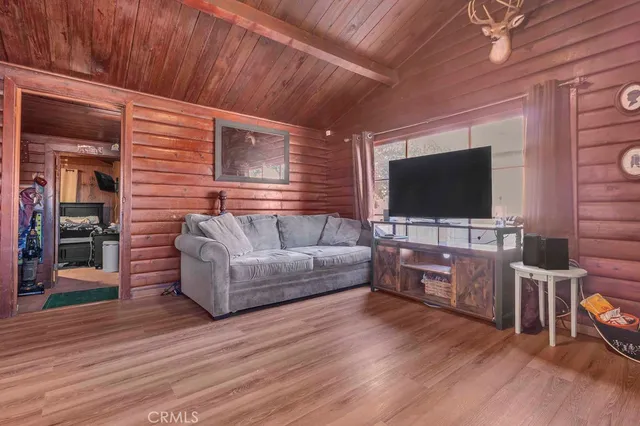 a front view of a building with outdoor seating