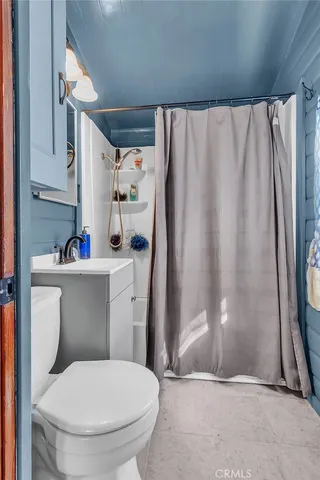 a view of a livingroom with furniture and deck