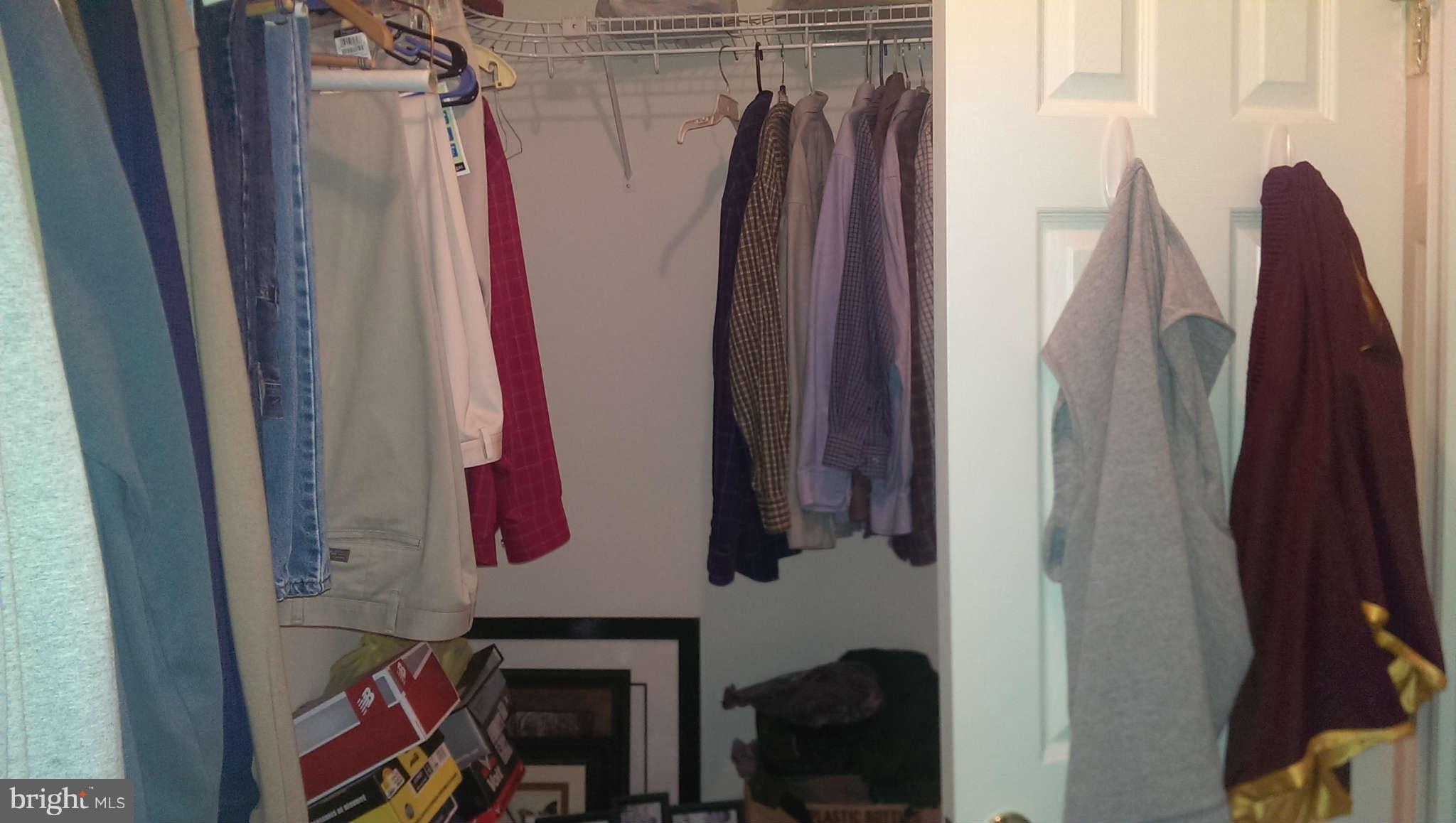 166 Peter Rabbit Drive Ranson, WV 25438 - Photo 5 of 14 a view of walk in closet with clothes