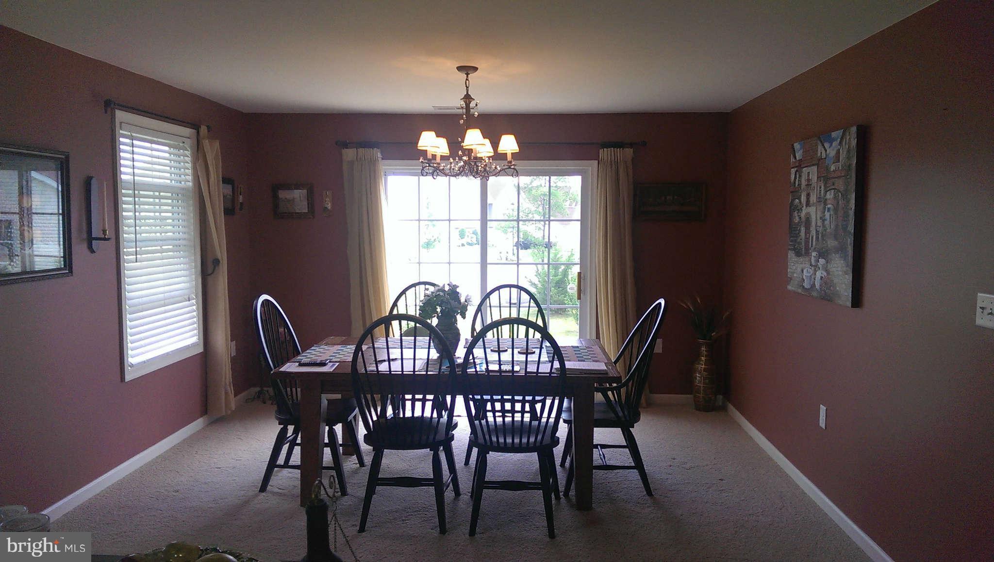 166 Peter Rabbit Drive Ranson, WV 25438 - Photo 6 of 14 a view of a dining room with furniture window and outside view