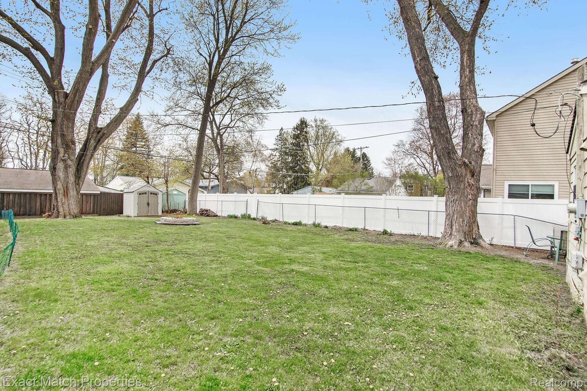 4115 Mapleleaf Road Waterford, MI 48328 - Photo 25 of 31 Large backyard. Only a small portion is fenced for the dog