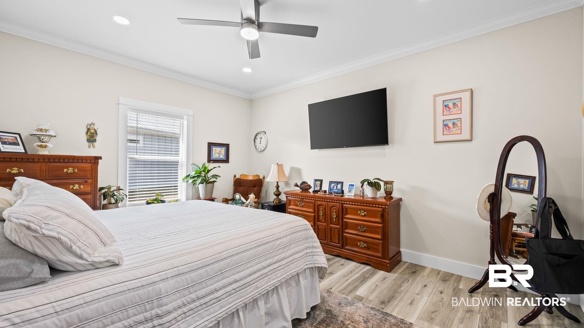 8013 Carmel Circle Foley, AL 36535 - Photo 17 of 49 Bedroom featuring light wood-style flooring, ornamental molding, a ceiling fan, and recessed lighting