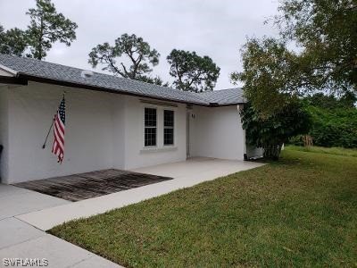 18 Kentucky Road Lehigh Acres, FL 33936 - Photo 4 of 34 a view of backyard of a house