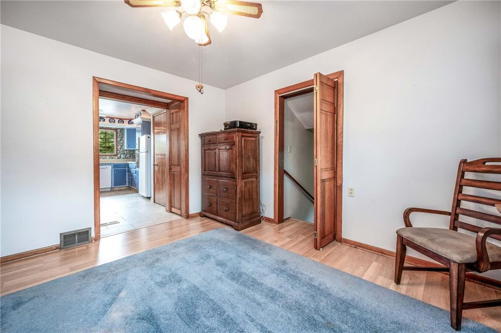 1380 Park Street Sharon, PA 16146 - Photo 14 of 39 wooden floor in an empty room with a window