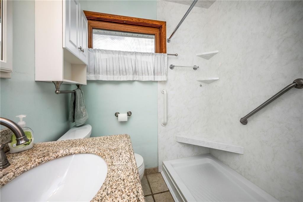 1380 Park Street Sharon, PA 16146 - Photo 17 of 39 a bathroom with a granite countertop sink and a mirror