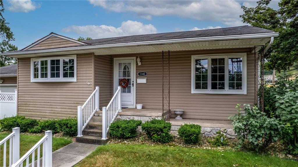 1380 Park Street Sharon, PA 16146 - Photo 2 of 39 a front view of a house with a yard