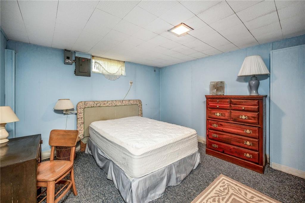 1380 Park Street Sharon, PA 16146 - Photo 23 of 39 a bedroom with a bed and a dresser in it