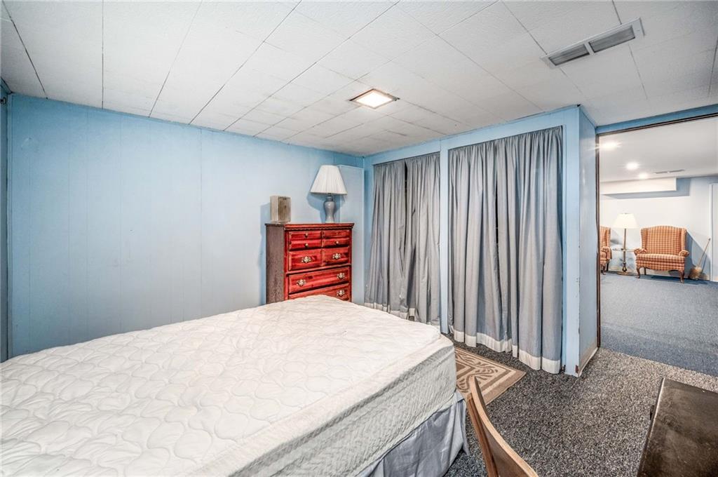 1380 Park Street Sharon, PA 16146 - Photo 24 of 39 a bedroom with a bed and a dresser