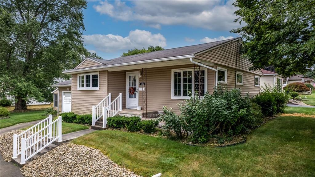 1380 Park Street Sharon, PA 16146 - Photo 27 of 39 a front view of a house with garden