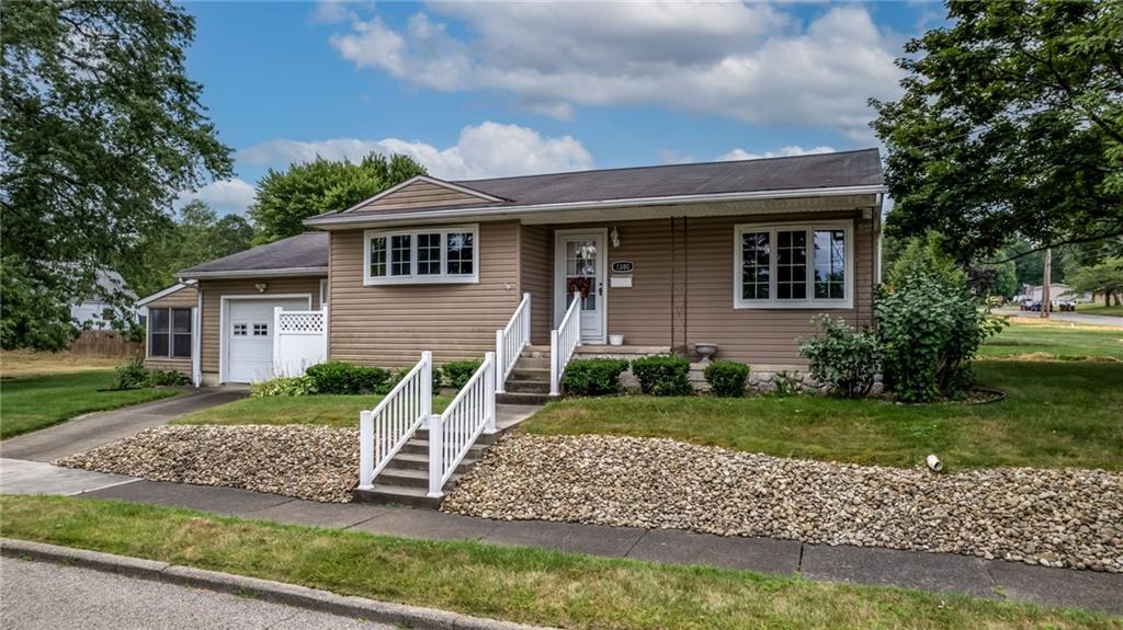 1380 Park Street Sharon, PA 16146 - Photo 28 of 39 a front view of a house with a yard