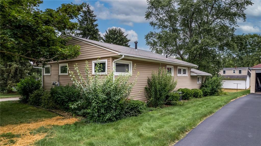1380 Park Street Sharon, PA 16146 - Photo 33 of 39 a view of a house with garden and yard