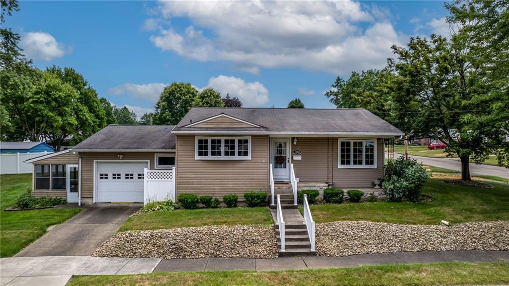 1380 Park Street Sharon, PA 16146 - Photo 35 of 39 a front view of a house with a yard