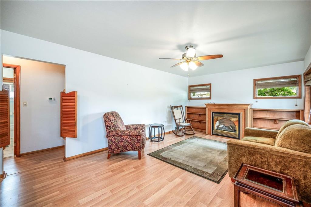1380 Park Street Sharon, PA 16146 - Photo 5 of 39 a living room with furniture and a fireplace