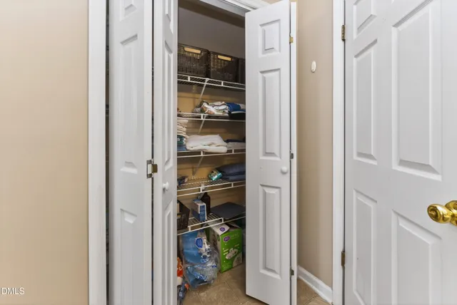 a bed room with furniture and a couch