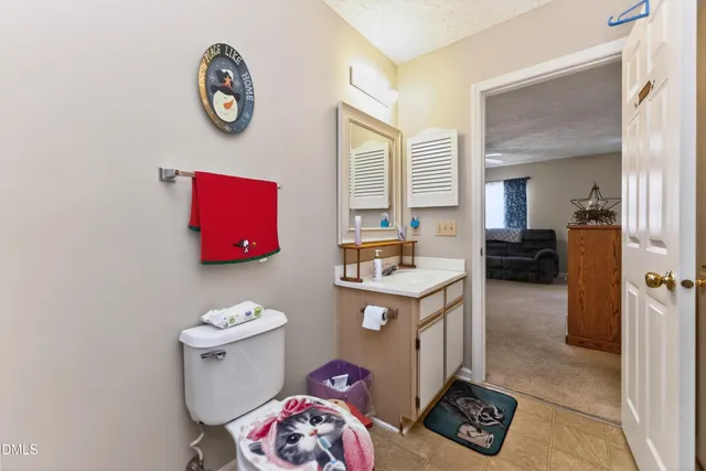 a bedroom with a bed and a cabinets