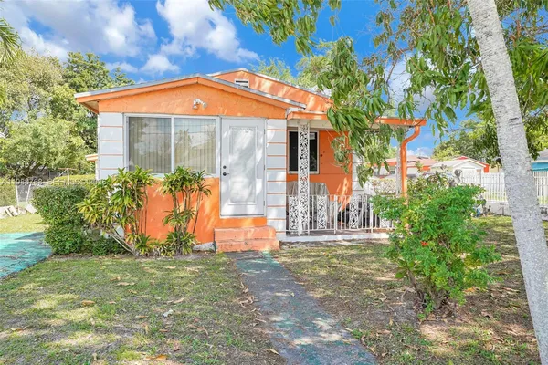 a view of a house with garden