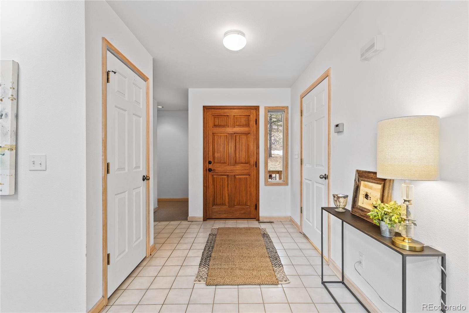 7313 Silverhorn Drive Evergreen, CO 80439 - Photo 6 of 40