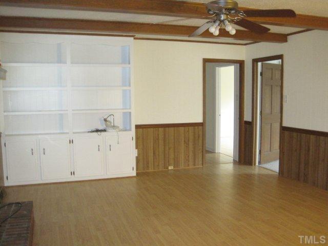 108 Hunters Road Oxford, NC 27565 - Photo 8 of 8 Den with Built-in Bookcases