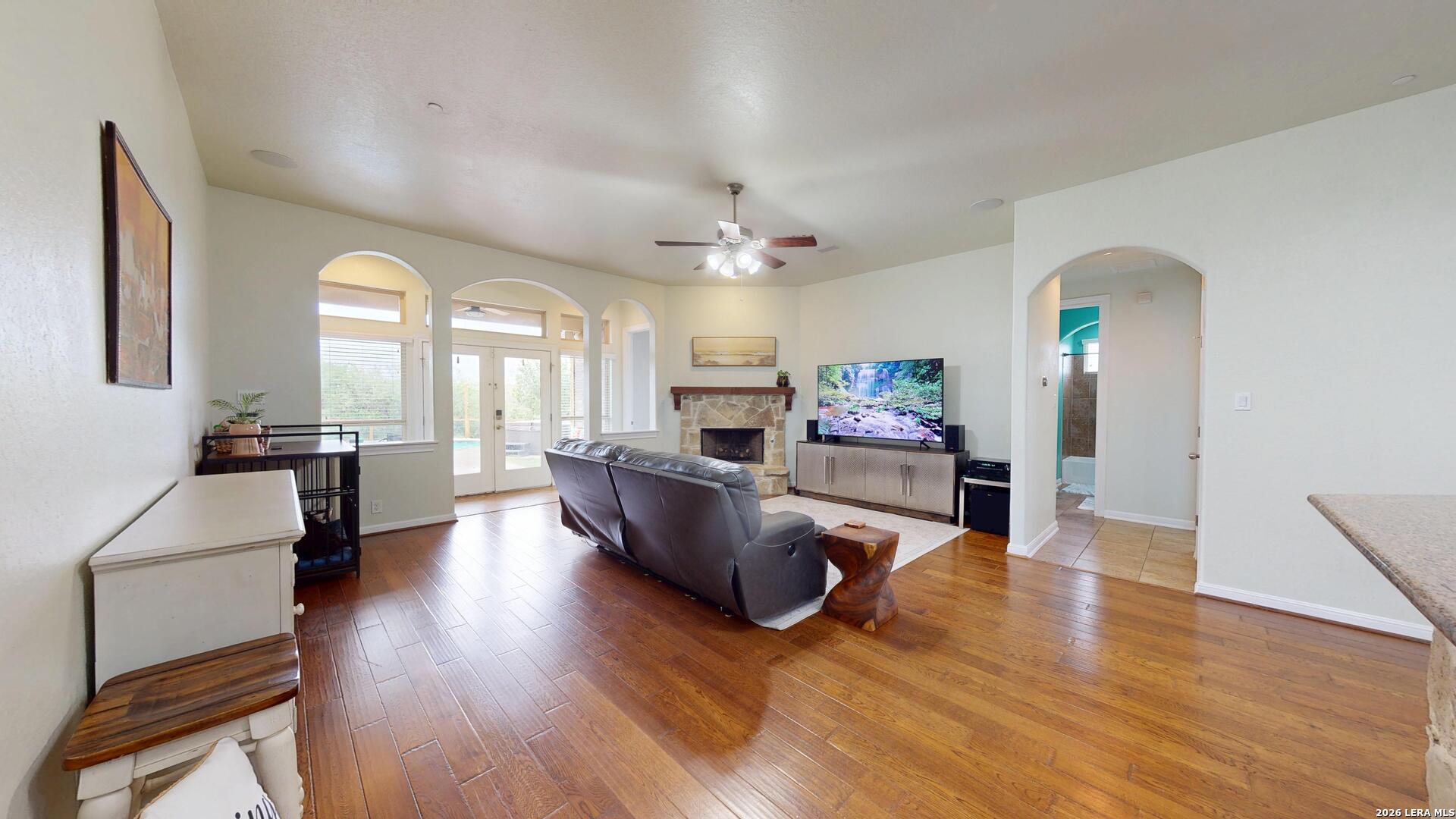 10111 Shallow Bank Converse, TX 78109 - Photo 25 of 65 a living room with furniture and a chandelier