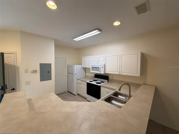 a view of a kitchen