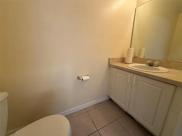 a bathroom with a sink and toilet