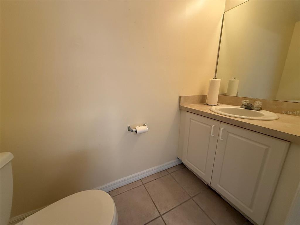 13200 West Newberry Road, Unit 29 Newberry, FL 32669 - Photo 6 of 14 a bathroom with a sink and toilet