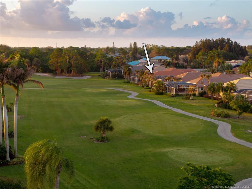 2216 Southeast Stonehaven Road Port St. Lucie, FL 34952 - Photo 48 of 67 a view of a golf course with a lake