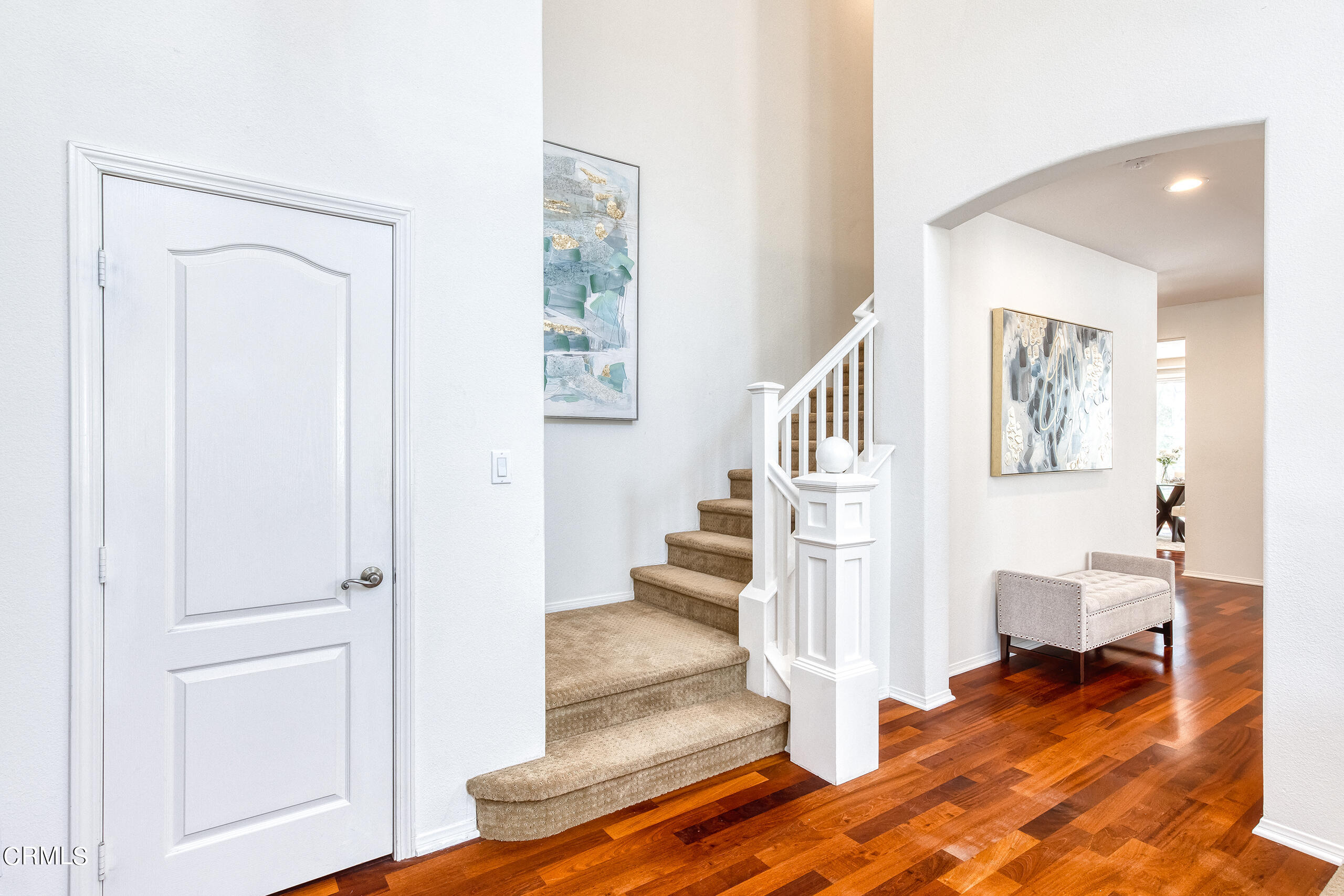 26569 Shakespeare Lane Stevenson Ranch, CA 91381 - Photo 21 of 55 a view of entryway and hall with wooden floor