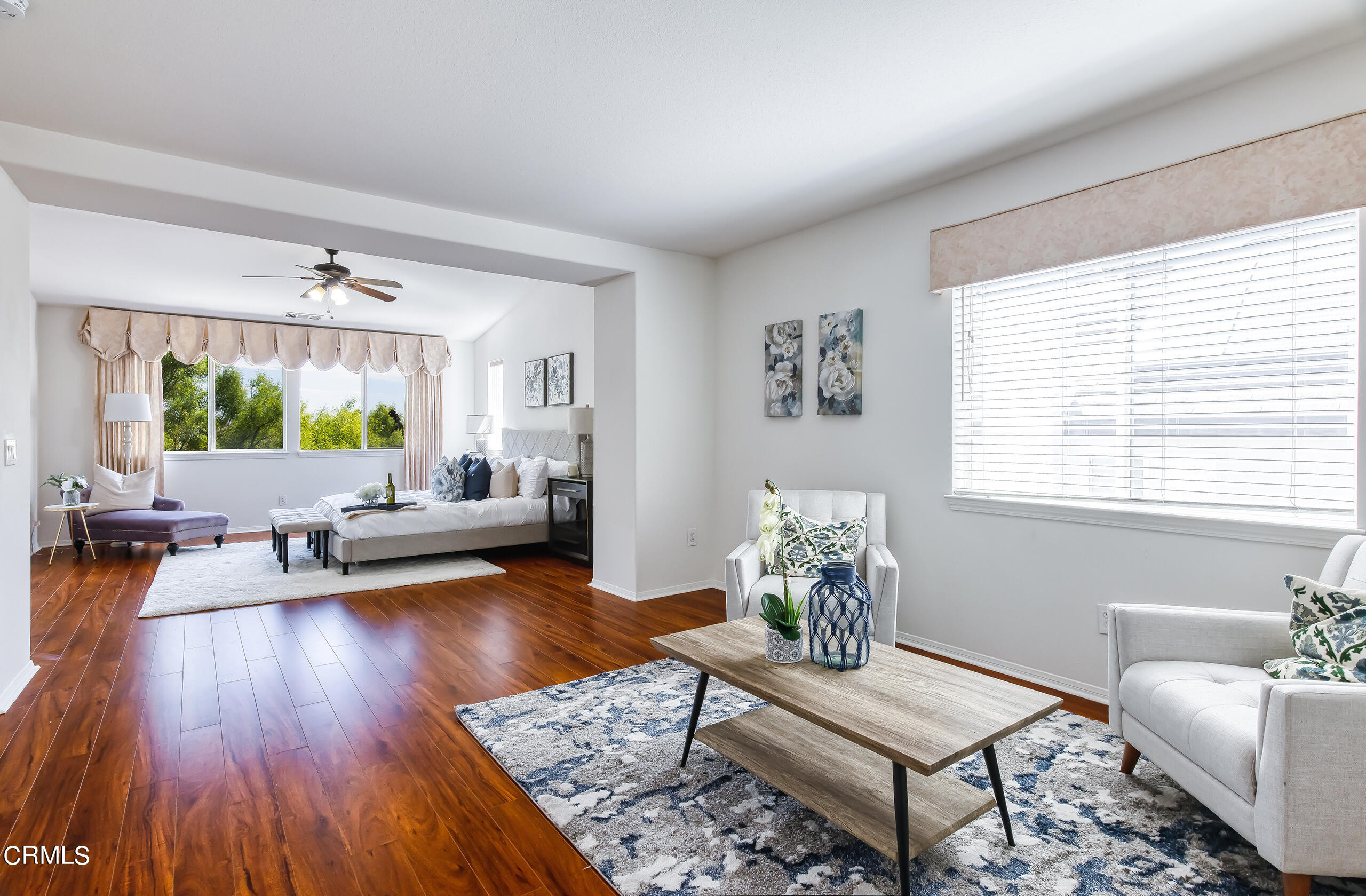26569 Shakespeare Lane Stevenson Ranch, CA 91381 - Photo 25 of 55 a living room with furniture and wooden floor