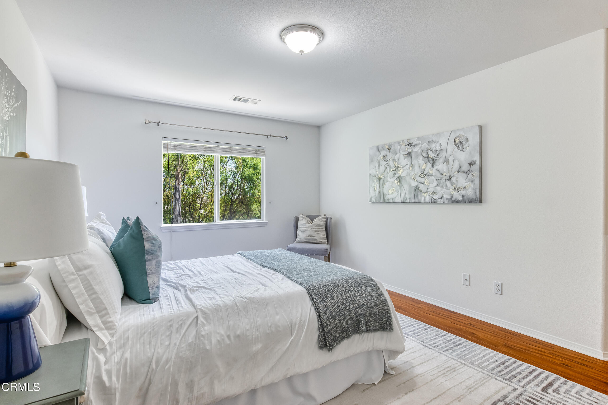 26569 Shakespeare Lane Stevenson Ranch, CA 91381 - Photo 32 of 55 a bedroom with a bed and a window