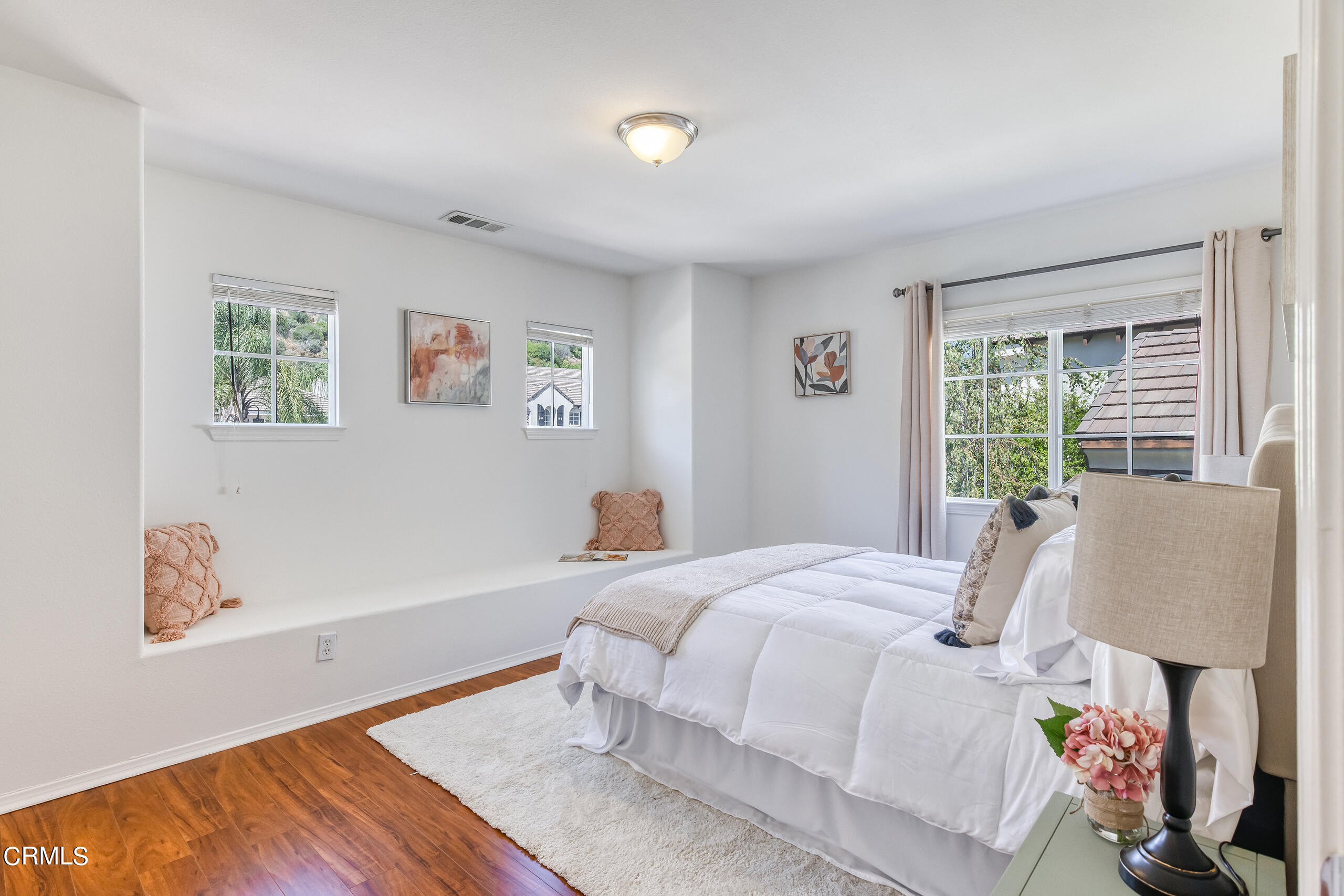 26569 Shakespeare Lane Stevenson Ranch, CA 91381 - Photo 39 of 55 a bedroom with bed and a window