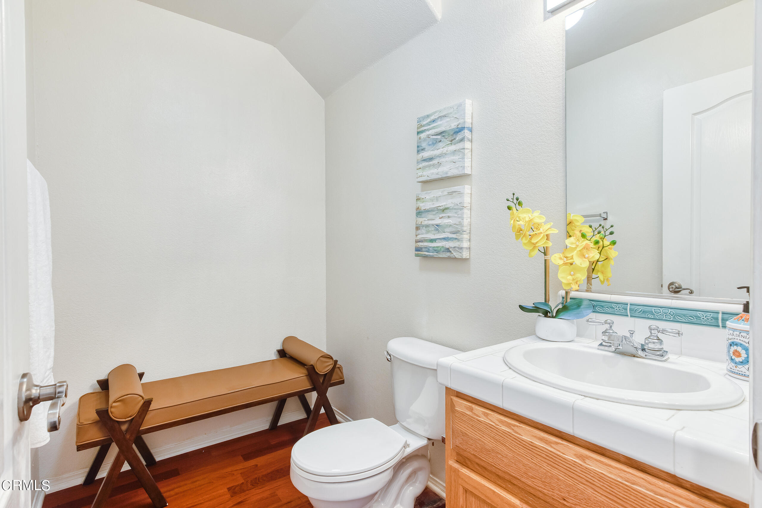 26569 Shakespeare Lane Stevenson Ranch, CA 91381 - Photo 42 of 55 a bathroom with a sink mirror vanity and toilet