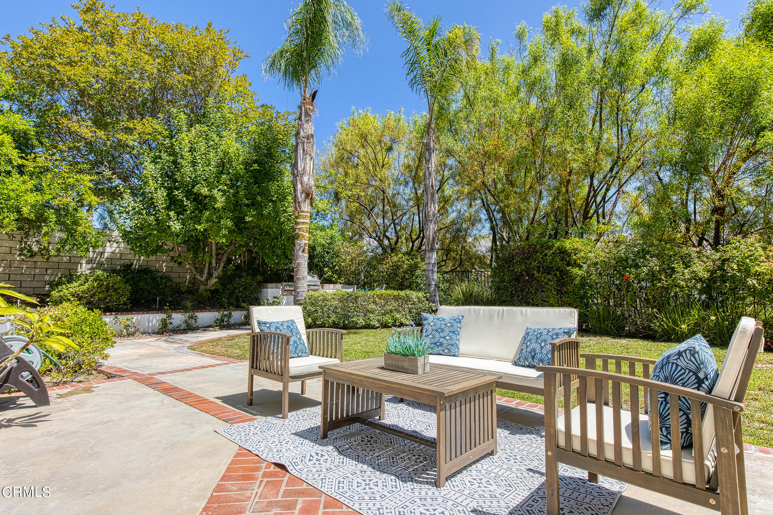 26569 Shakespeare Lane Stevenson Ranch, CA 91381 - Photo 45 of 55 a view of a patio with a table and chairs