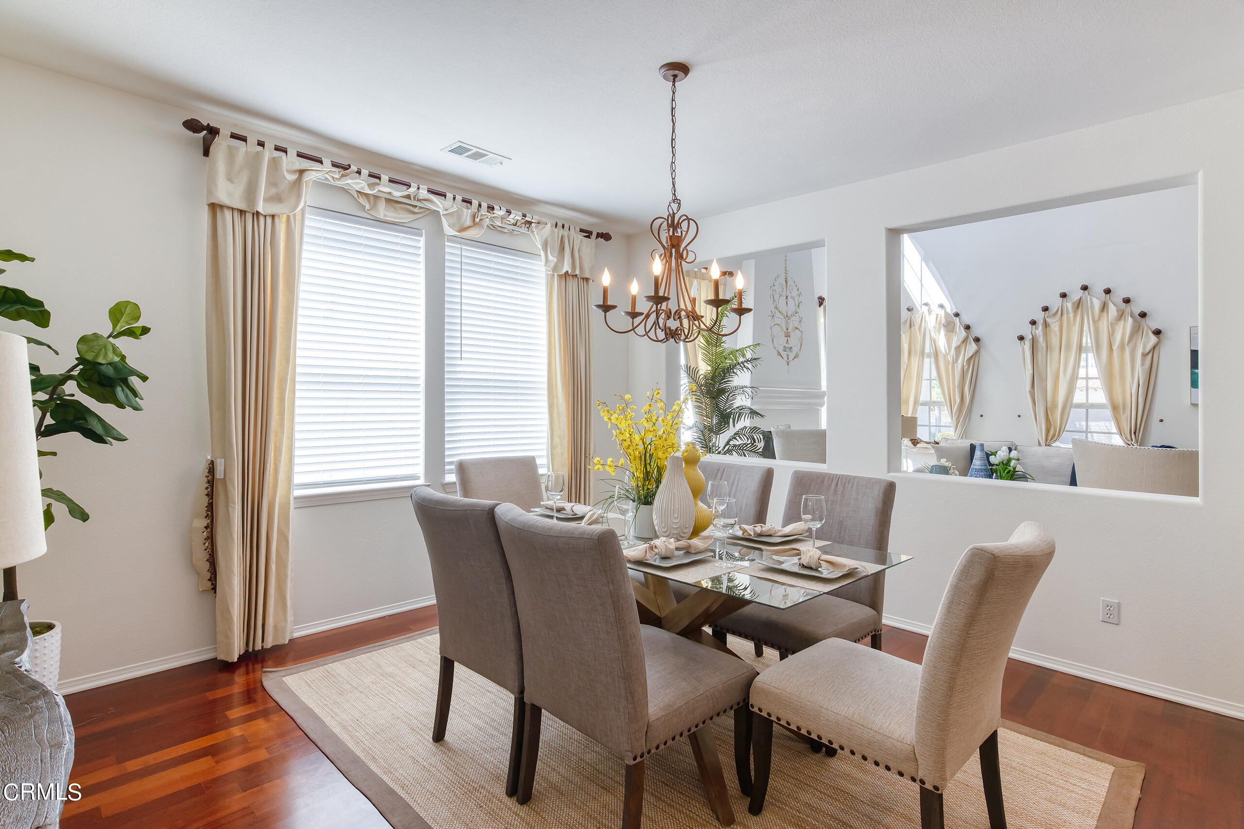 26569 Shakespeare Lane Stevenson Ranch, CA 91381 - Photo 7 of 55 a view of a dining room with furniture window and wooden floor