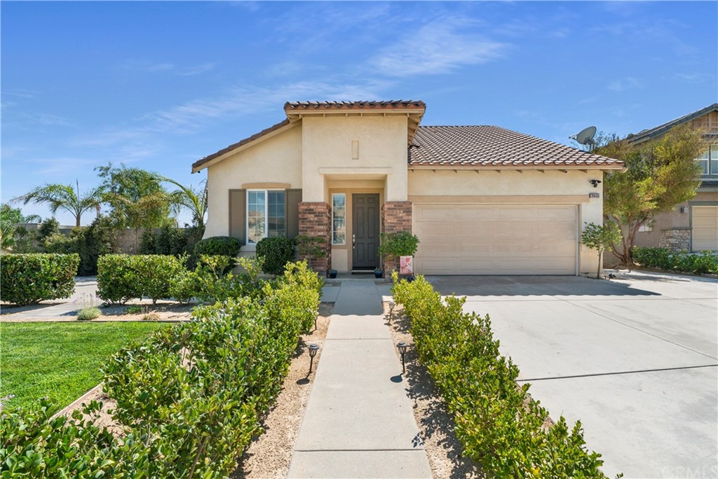 20635 Iris Canyon Road Riverside, CA 92508 - Photo 1 of 1 a view of a house with a small yard and plants