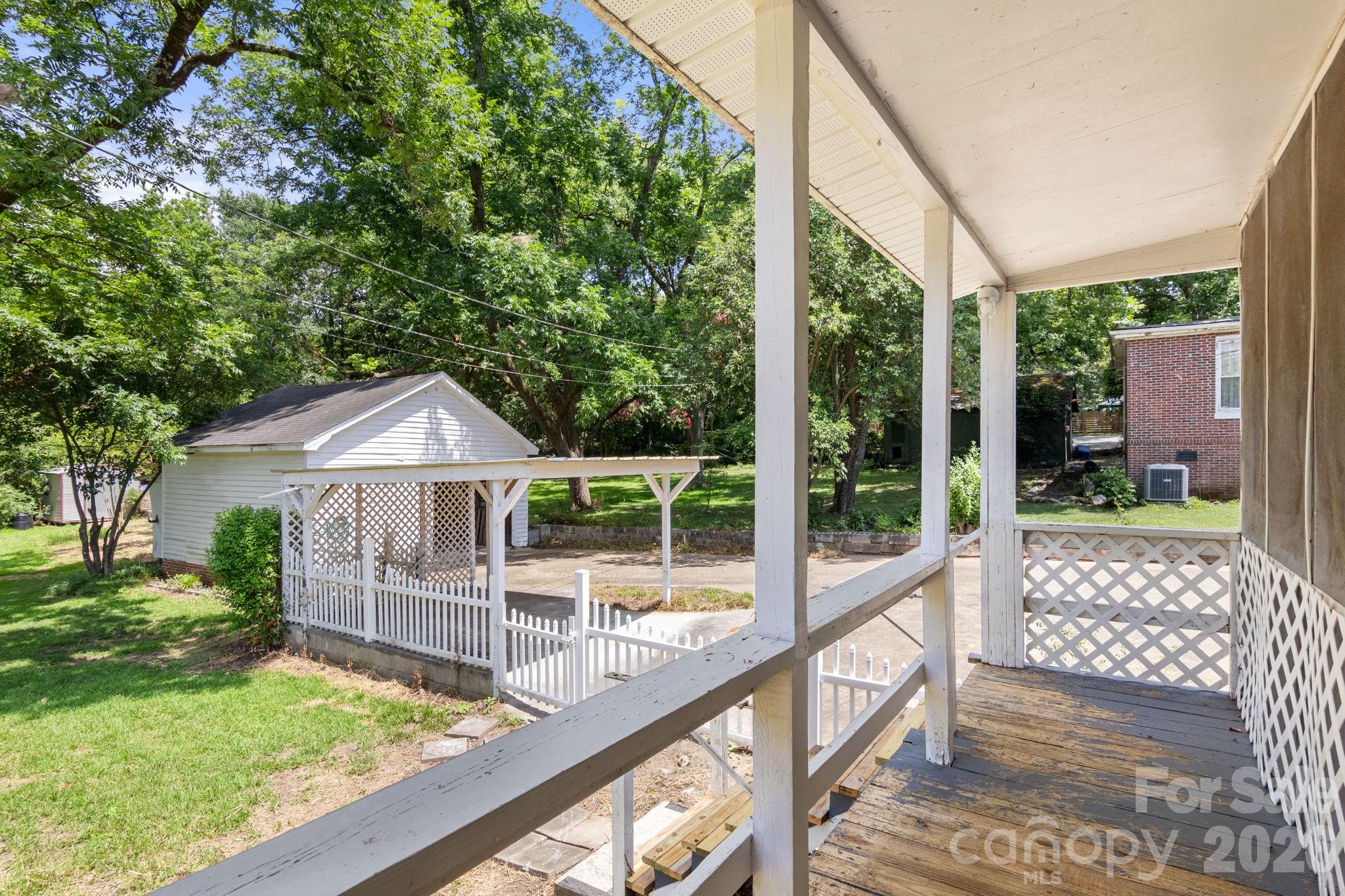 108 Reedy Street Chester, SC 29706 - Photo 38 of 42 a view of a house with backyard and porch