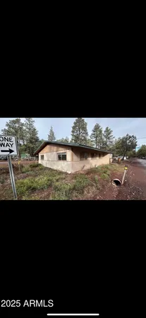 a view of swimming pool from yard