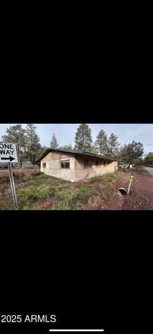 a view of swimming pool from yard