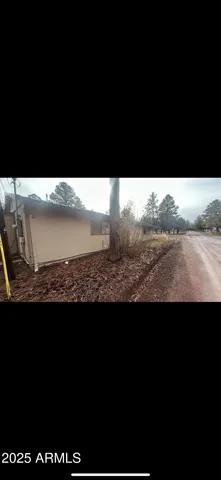 a view of an outdoor space and a lake